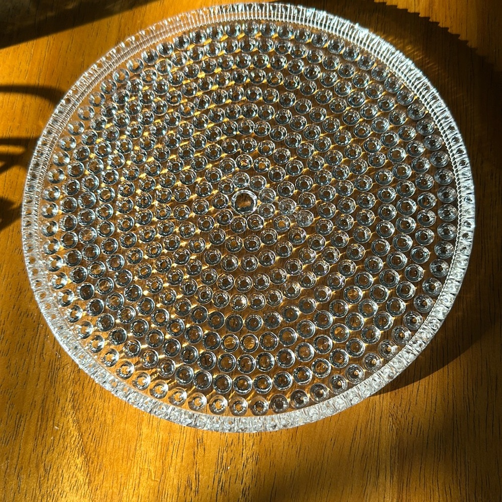 Doyle & co.Vintage hobnail clear glass dish. 7 1/4”. This dish has a lip on it.